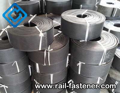 Continuous crane rail pads 